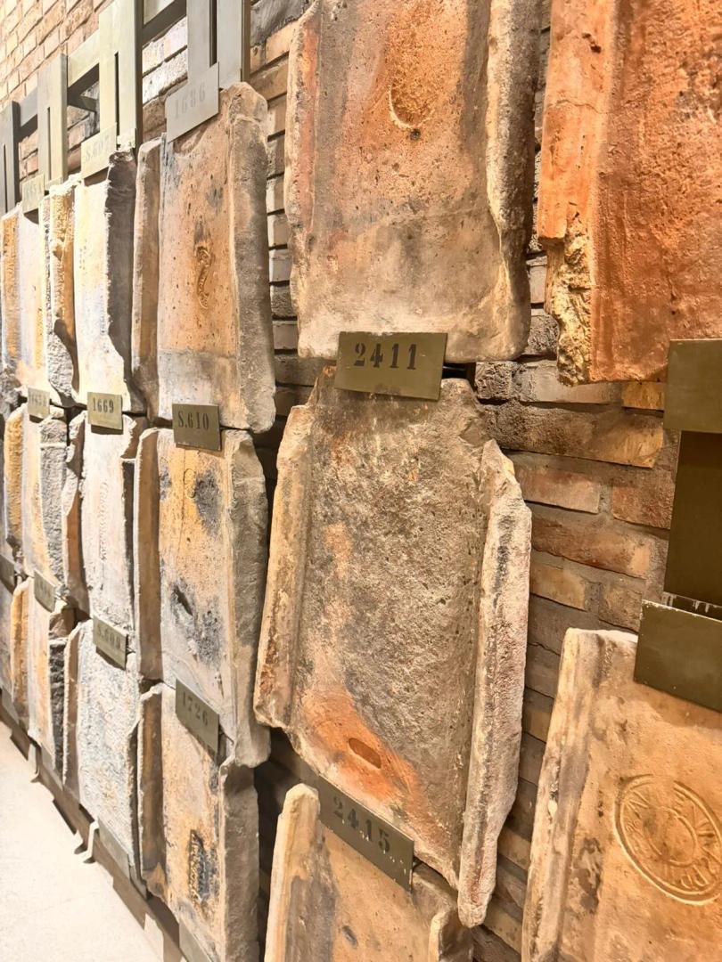 Collection of ancient Roman bricks displayed inside the Santa Maria Maggiore Basilica