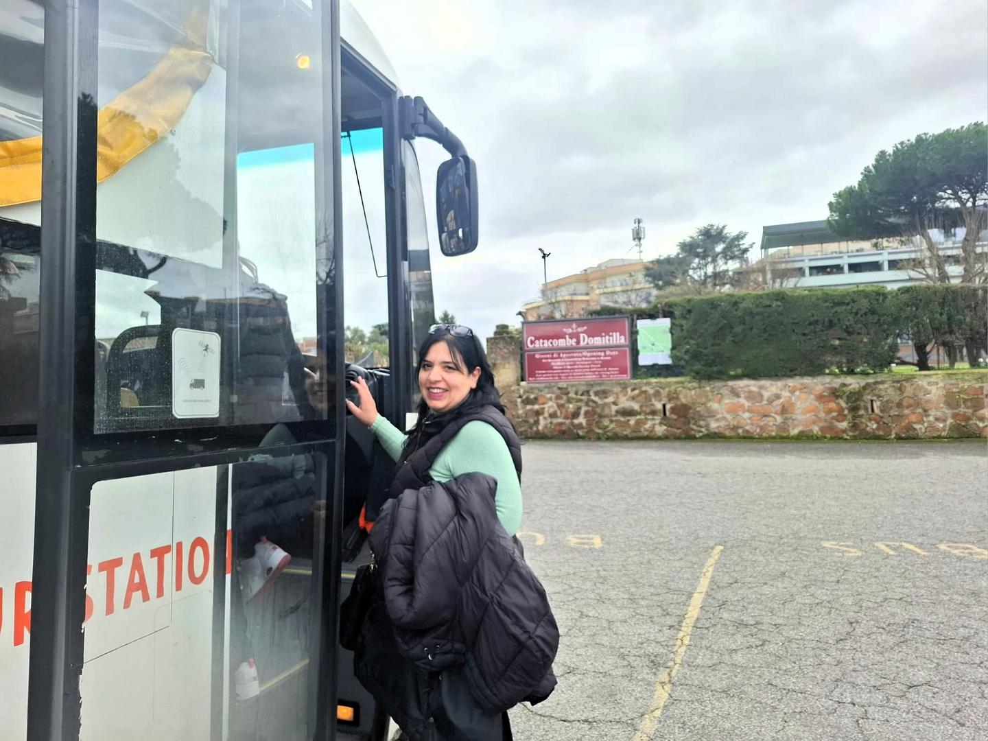 Woman entering the bus